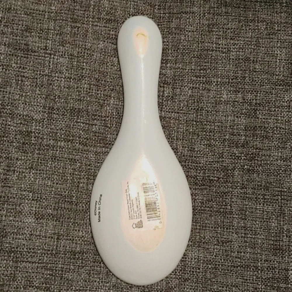 Mickey Mouse sketch style spoon rest.